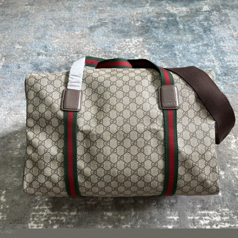 G*u*i top handle bags